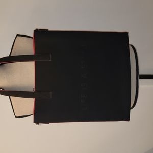 Makeup forever life is stage black and red tote.